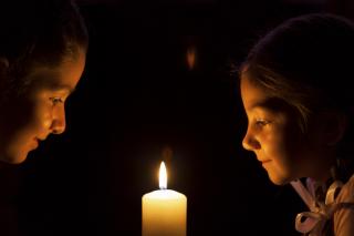 Little girls with candle