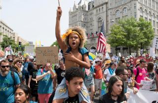 Levi Draheim chants as he marches with thousands down Pennsylvania Avenue in Washington, D.C., during the People’s Climate March on April 29, 2017. 