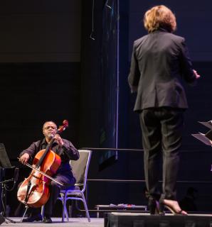 Cellist Clovice A. Lewis Jr. and conductor Martha Swisher at Sunday morning worship at GA 2019.