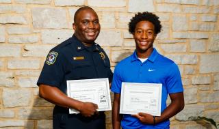 Commander Michaus Williams with mentee Alex Wiley, who spent four weeks interning with the Naperville Police.