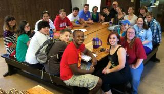 Youth and adult leaders gather at the start of Camp Murray, a UU summer camp in Oklahoma, in June 2015.