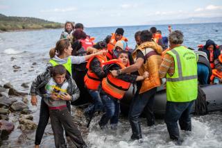refugee raft arrives in Greece, October 2, 2015