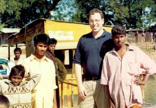 Dr. Seth Frisbie (center) travels frequently from Vermont to Bangladesh to measure arsenic levels in drinking water and help people identify the safest wells to use.