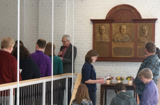 The Rev. Harlan Limpert leads UUA staff in reading a litany of rededication for a memorial to Jimmie Lee Jackson, the Rev. James Reeb, and Viola Liuzzo