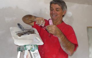 Terry Allen volunteers his construction skills in New Orleans in 2011