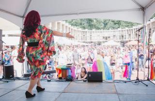Drag queen emcee Delta B Knyght entertains the crowd at Reston, VA Pride 2019.