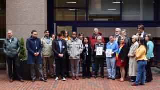 UUA trustees, members of the administration, and observers from other UU organizations gather outside the UUA headquarters on April 20 for a moment of silence in solidarity with students who walked out of schools to protest gun violence. 